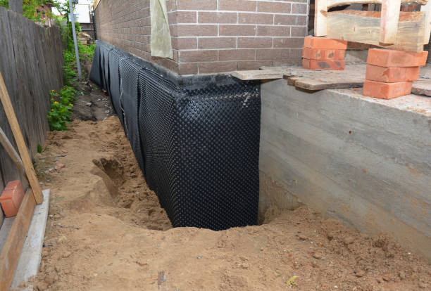 SJ Waterproofing Pros technician performing targeted Interior Drainage System assessment in Union, NJ